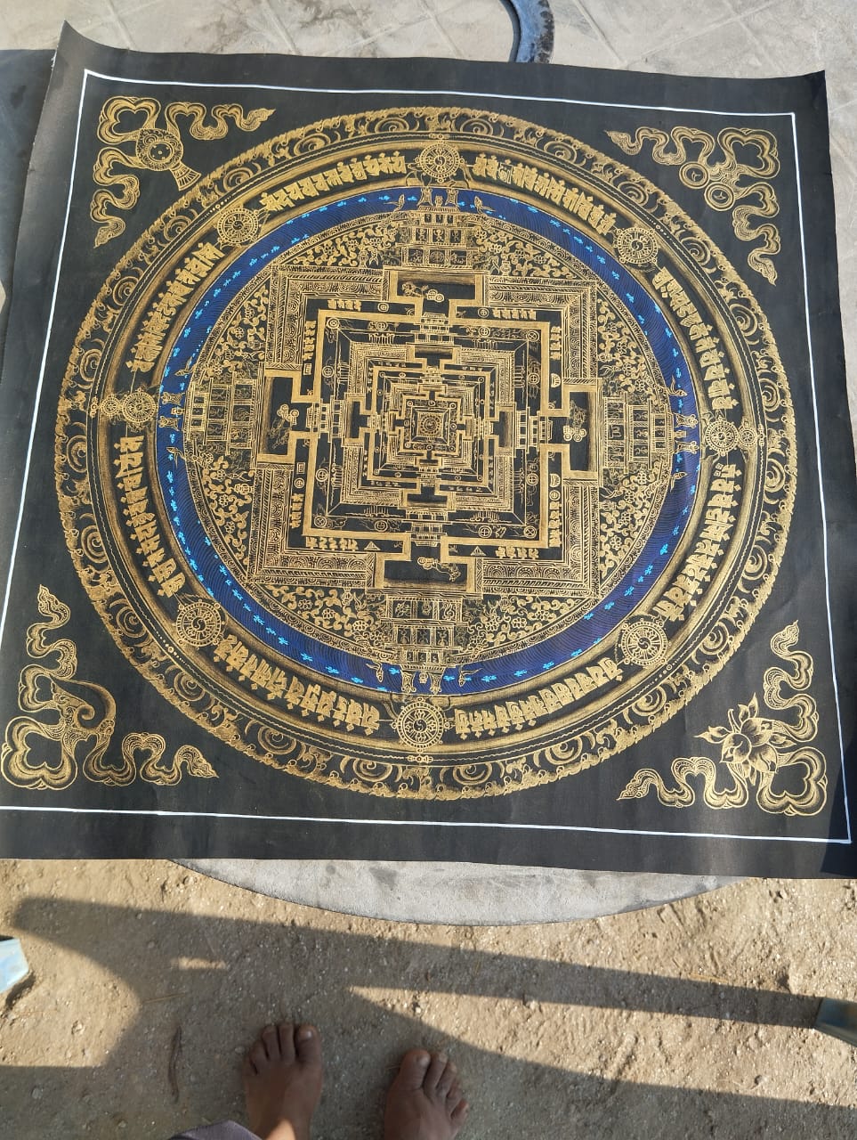 Gold on Black Mandala Thangka painting with Blue Ring – Hand Painted Sacred Geometry - Artofnepal
